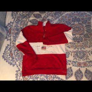 Red and white collared sweater